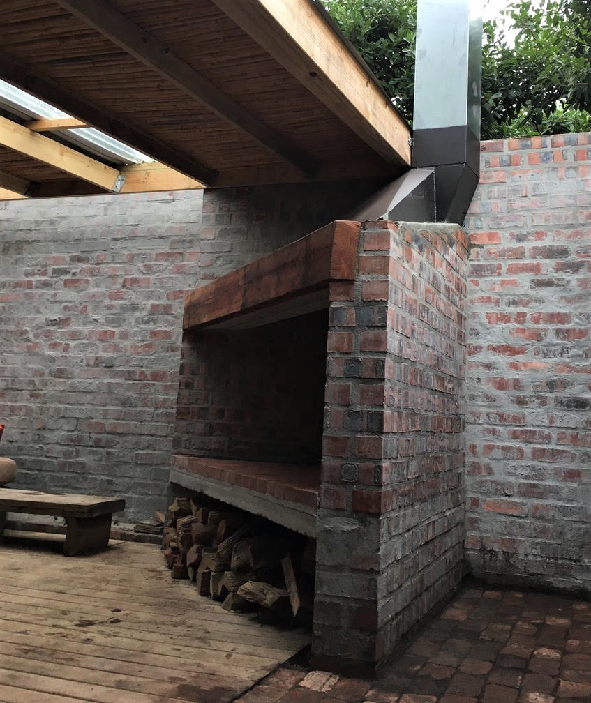 Outdoor fireplace by W0RX Carpentry and Construction